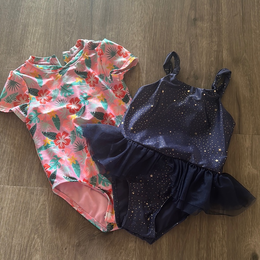 Two one piece bathing suits